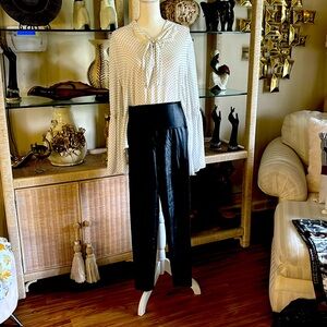 I have a black and white polka dots blouse with leather look leggings